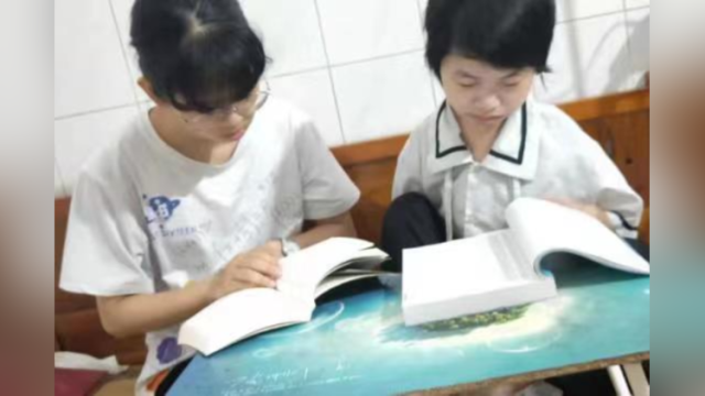 一起上学的约定:湛江女孩患病被妹妹贴身照顾,均考过本科线