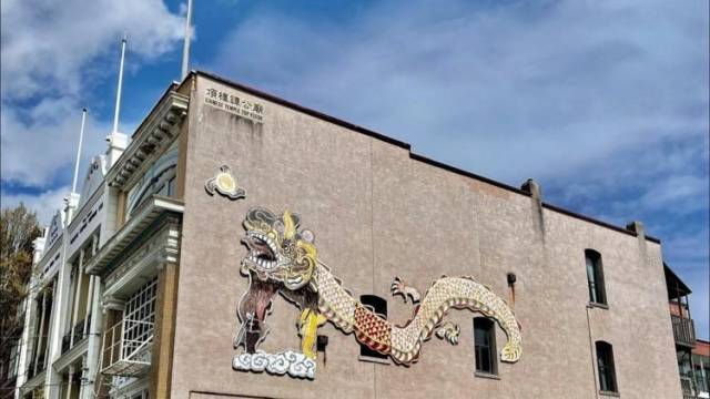 谭公民俗文化从广东到加拿大：百年庙宇为游客提供英语服务