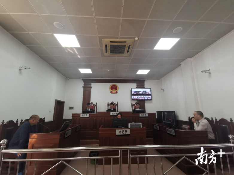 “执行开庭”现场罗某与吴某达成执行和解。
