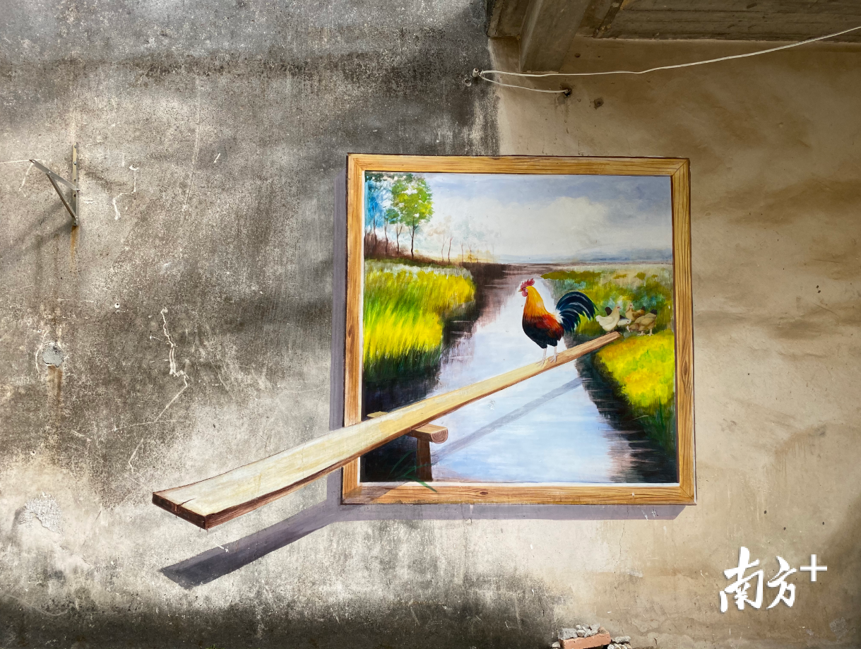 村里随处可见壁画作品。叶彤 摄 村里随处可见壁画作品。叶彤 摄