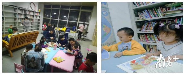 居民在骏马山庄小区图书服务站享受阅读