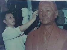 雕塑家父子为袁隆平树碑立传