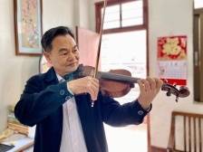 高州市音乐家协会副主席周茂：用音乐展现新时代风采