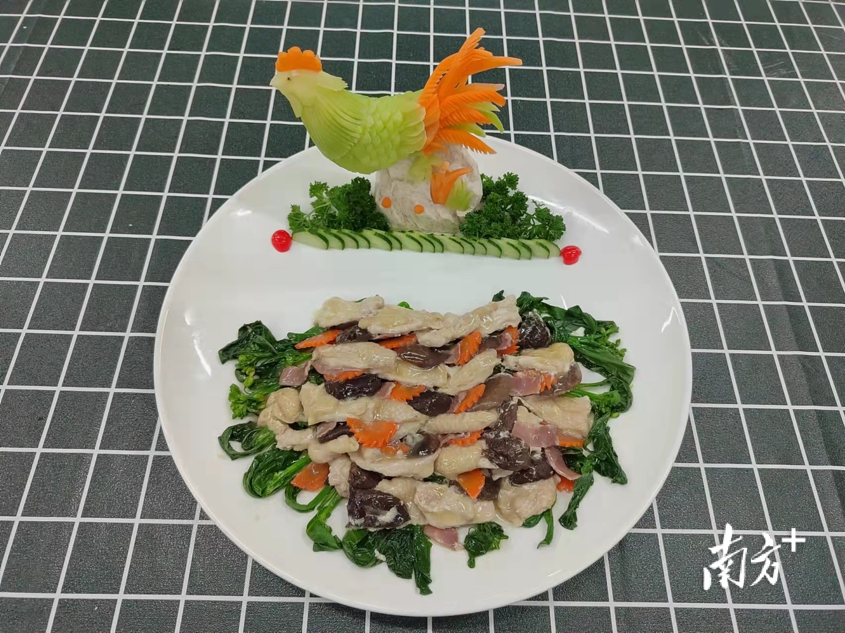 以芥兰为原材料制作的特色菜品。 以芥兰为原材料制作的特色菜品。