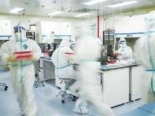 机器不停人不停！珠海两家核酸检测基地高效运转