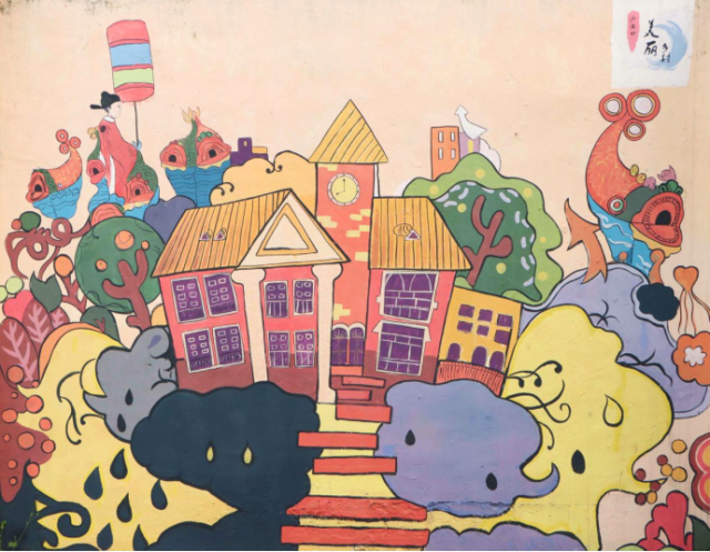 沙涌村内以鳌鱼传说为主题创作的墙画。图/郑少锋