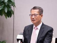 香港做好“超级联系人”，助力国家双循环 | 访陈茂波