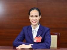 胡春华代表：在“十米车厢”为城市增添文明暖色