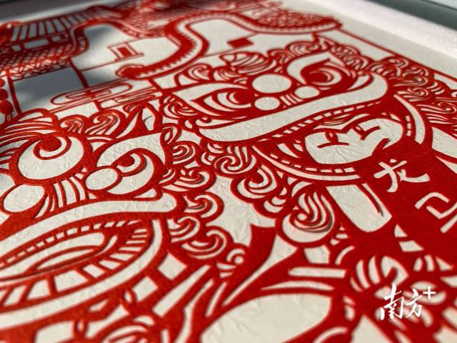 佛山纯色剪纸《狮舞龙跃 腾达岭南》.佛山民间艺术研究社 供图