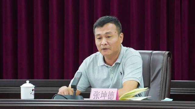 張坤德