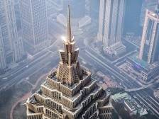 金茂为何销售额增长两成，归母净利却大跌八成？｜冷眼看财报